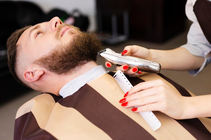 woman-shaving-her-client-s-mustache